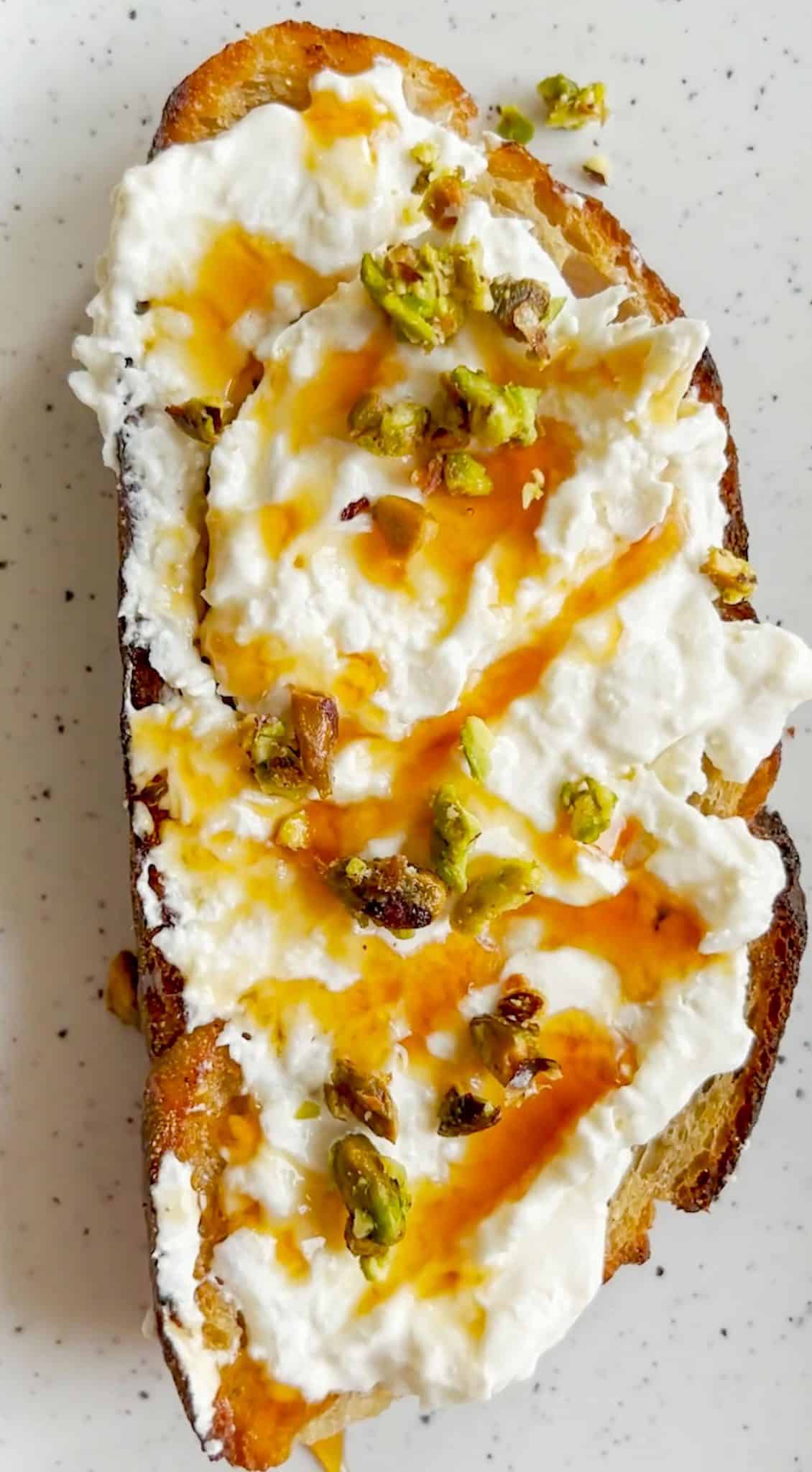 Burrata toast with pistachios and hot honey bon abbetit
