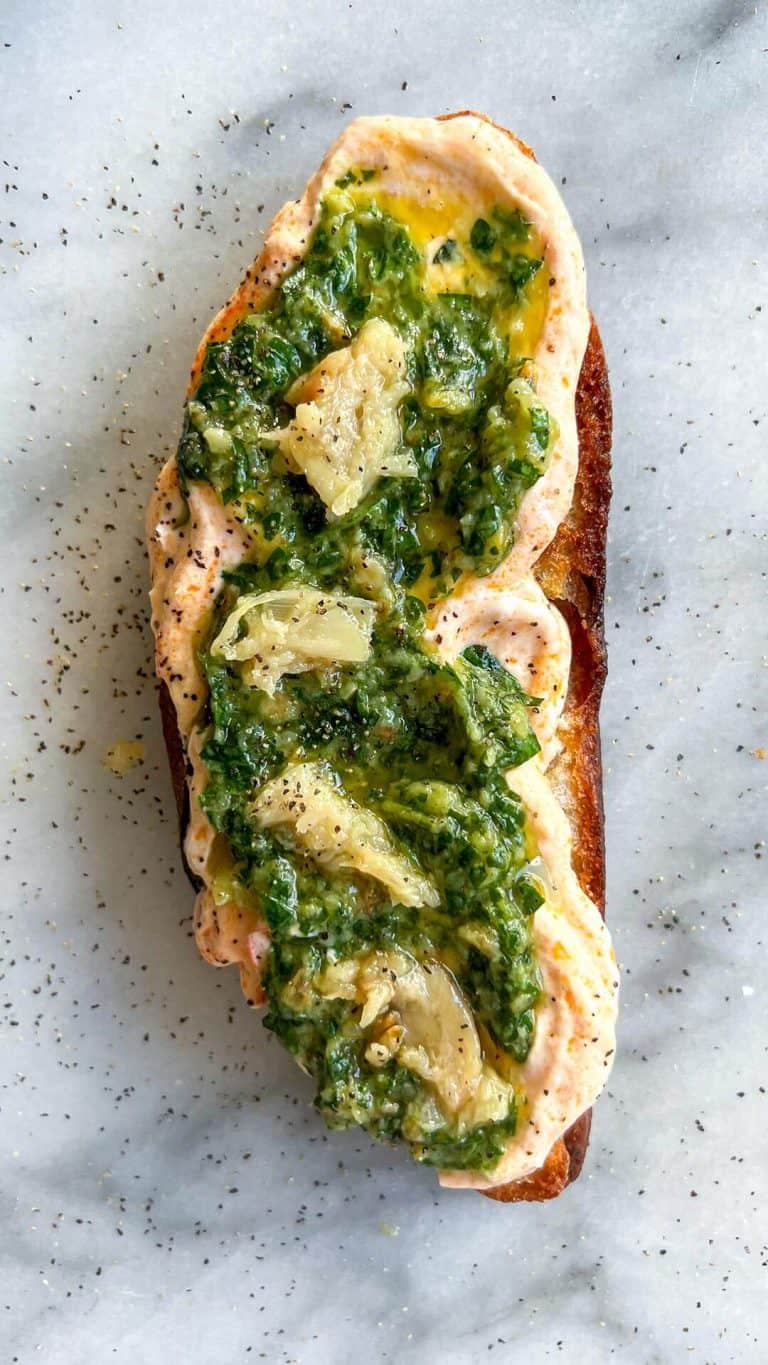 Sourdough with a hot harissa yogurt and roasted garlic and herbs bon