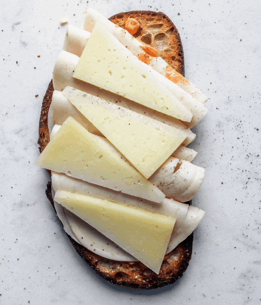 turkey, cheese and bread for a warm turkey sandwich