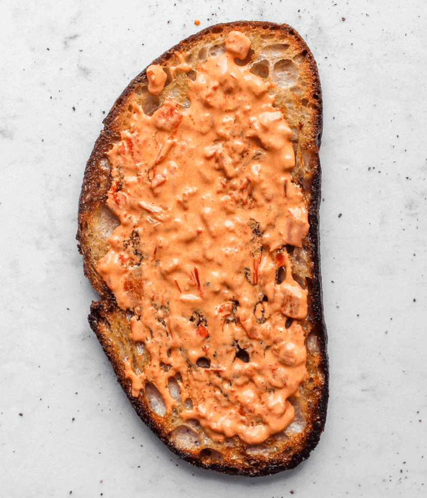 mayo on bread for a warm turkey sandwich