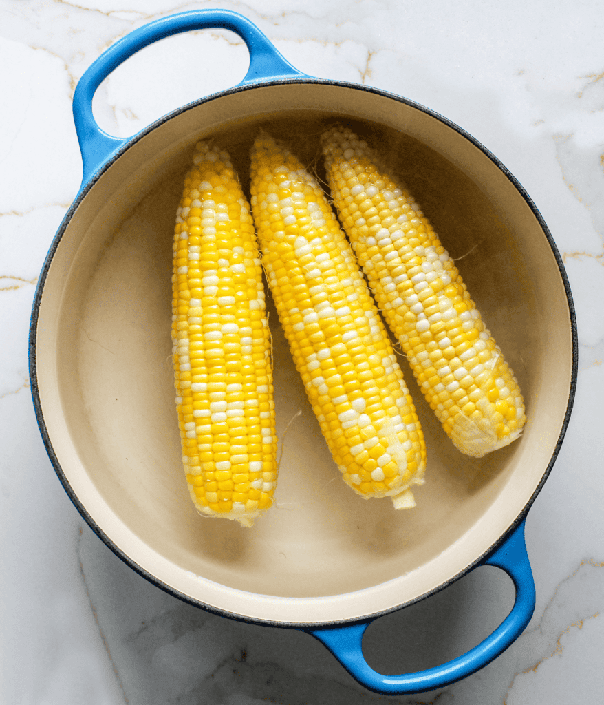 corn in a bowl for a pearl couscous salad
