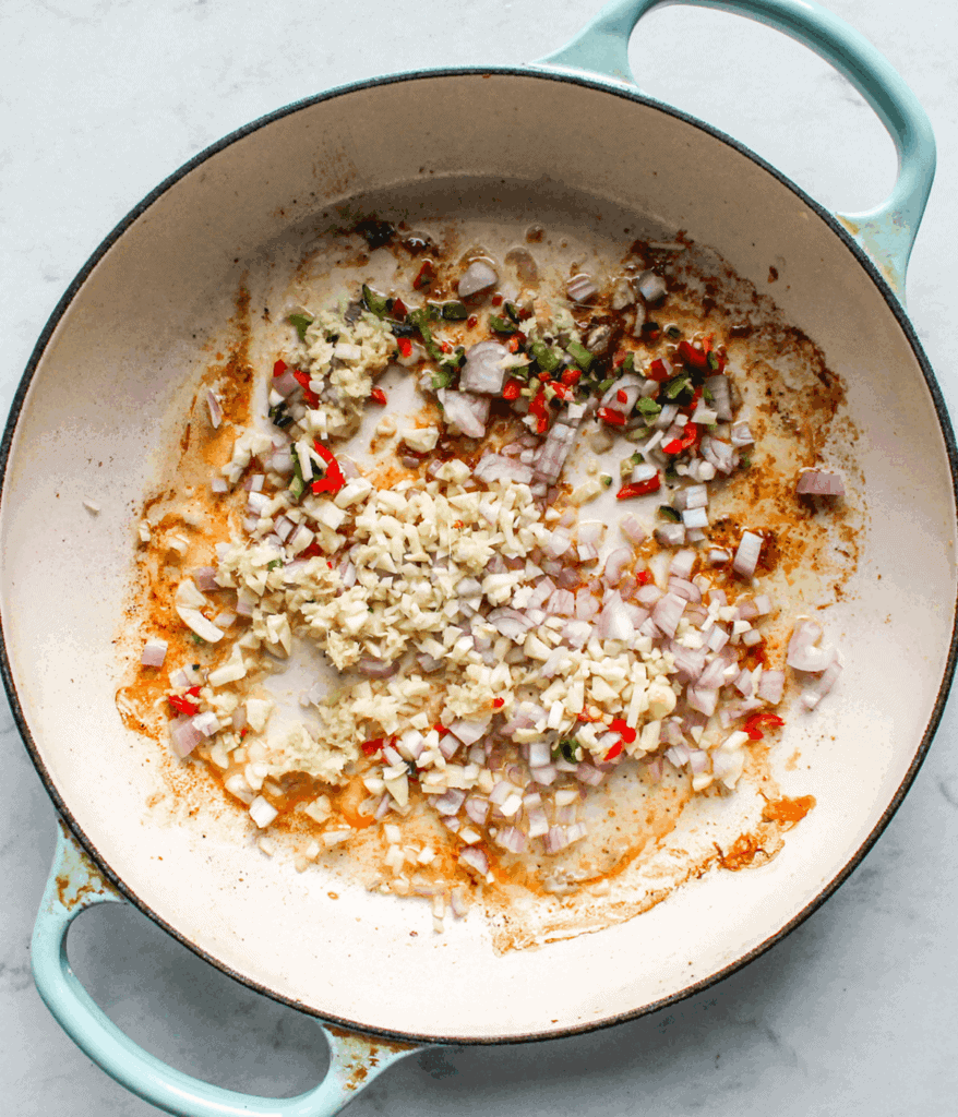 aromatics in pot for spicy coconut chicken soup