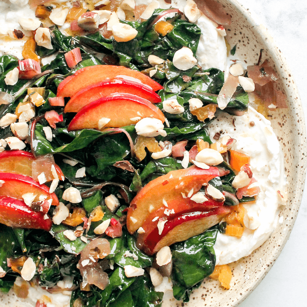 plate of peach and burrata salad 