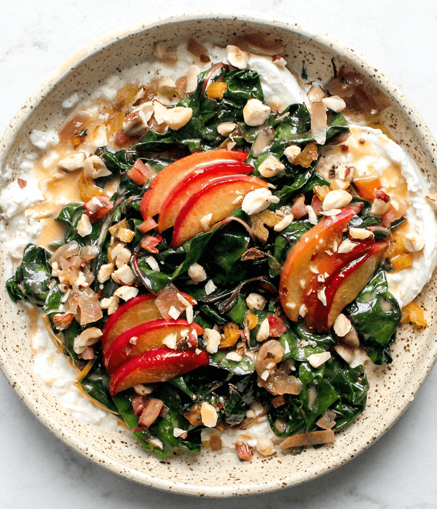 plate of peach and burrata salad