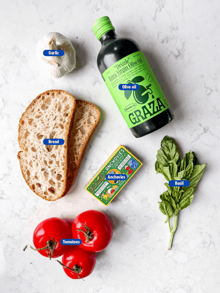 labeled ingredients for pan con tomate with anchovies