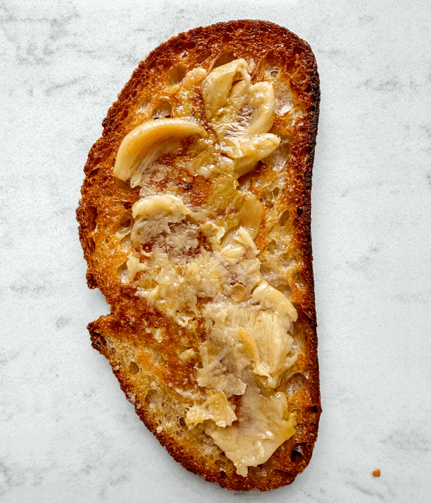 garlic confit on toast for pan con tomate with anchovies