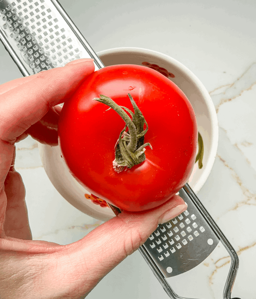 grated tomatoes for pan con tomate with anchovies