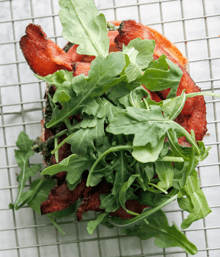 layered ingredients for blt bagel