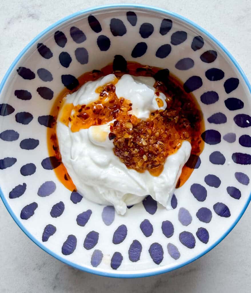 calabrian chili yogurt for sausage breakfast sandwich