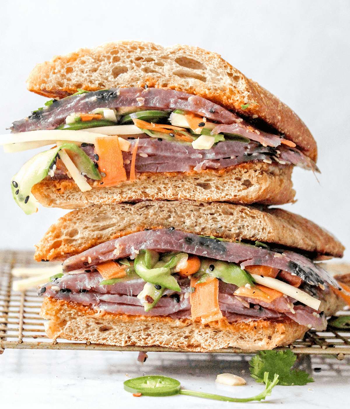 Bánh Mì style sandwich stacked on top of each other