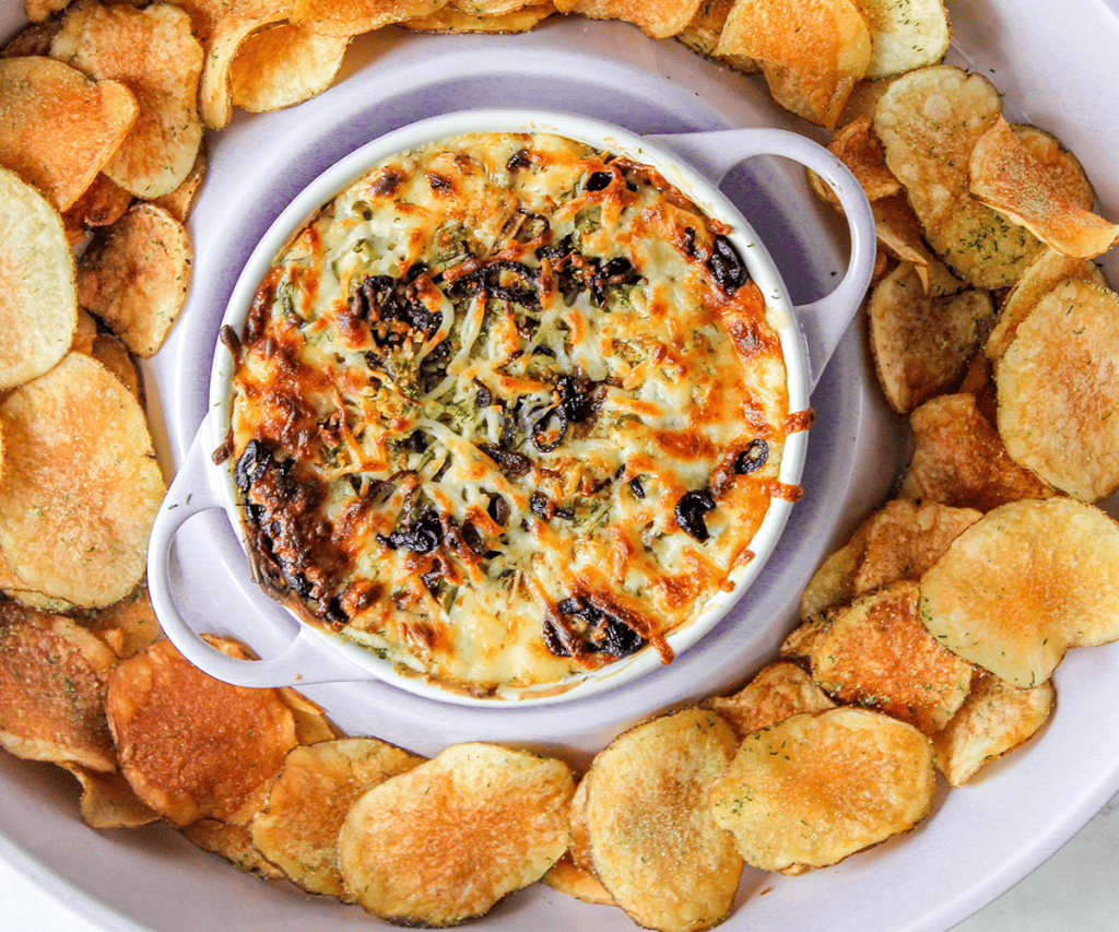 pickle dip and homemade chips served in a dip platter
