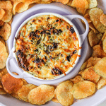 pickle dip and homemade chips served in a dip platter
