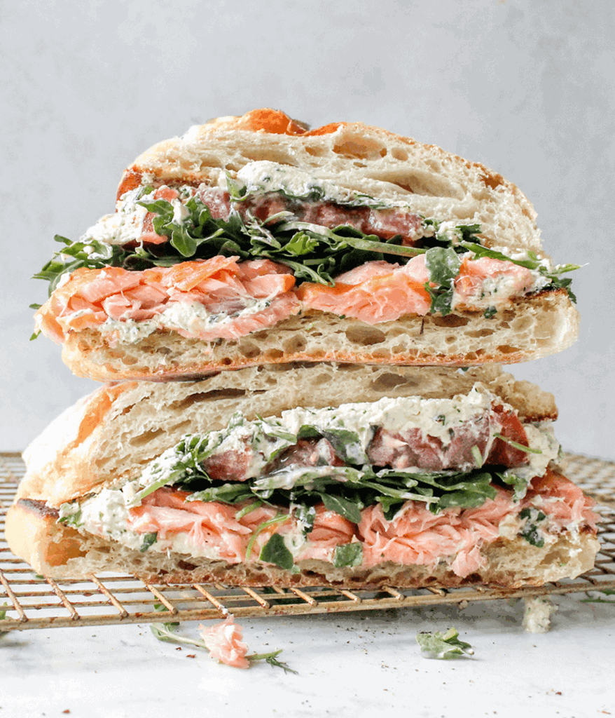 close up of Salmon goat cheese sandwich
