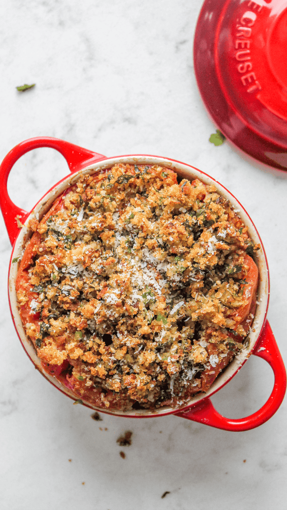 cocotte filled with breadcrumb stuffed tomatoes