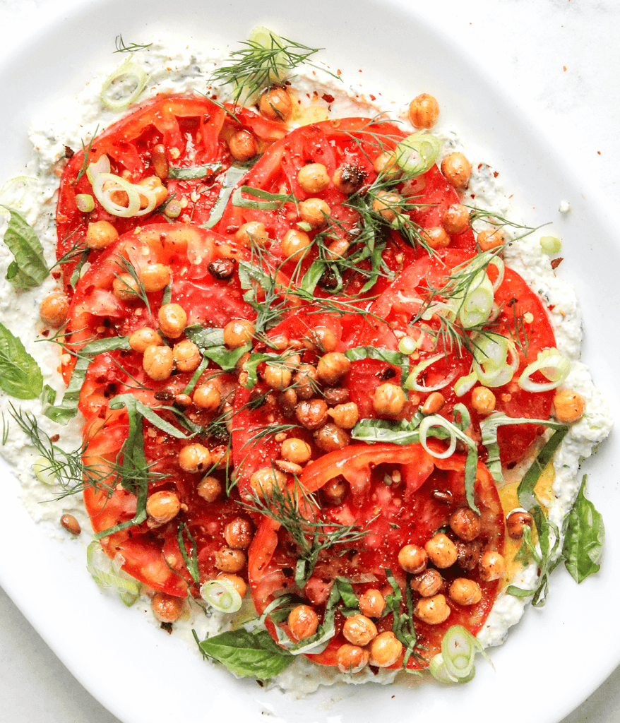 a plate with chickpea tomato cottage cheese salad