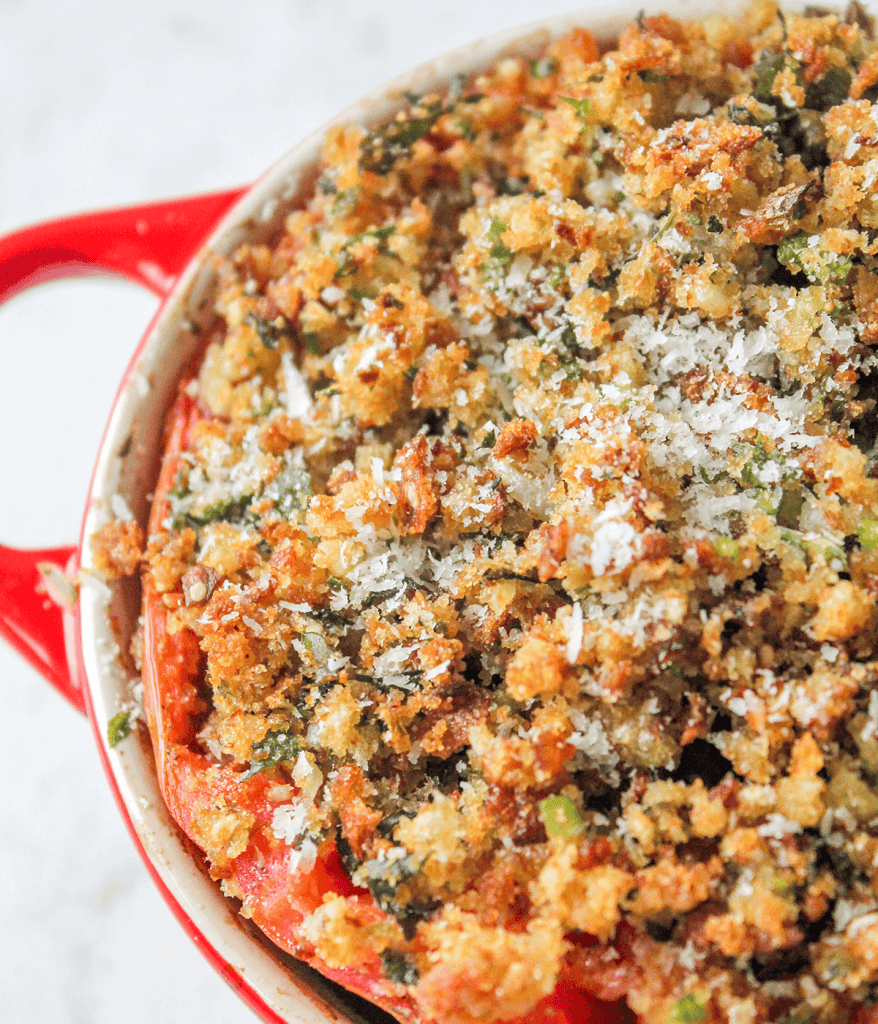 cocotte filled with breadcrumb stuffed tomatoes