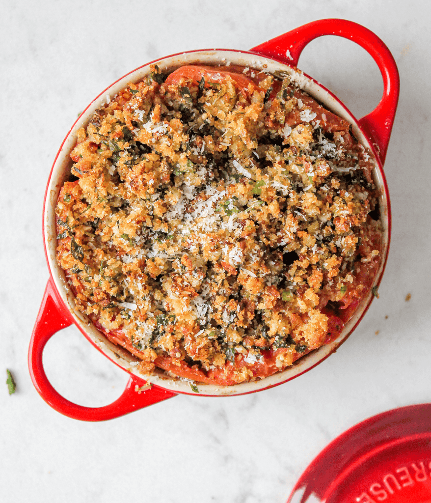 cocotte filled with breadcrumb stuffed tomatoes
