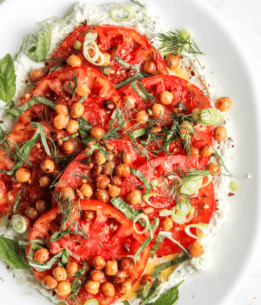 a plate with chickpea tomato cottage cheese salad