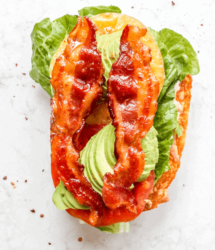 layered ingredients of an Avocado BLT