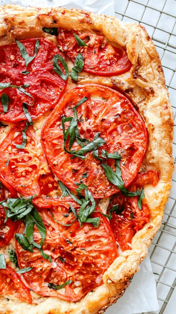 close up of puff pastry tomato tart