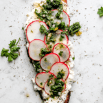 toast with burrata chimichurri and radishes