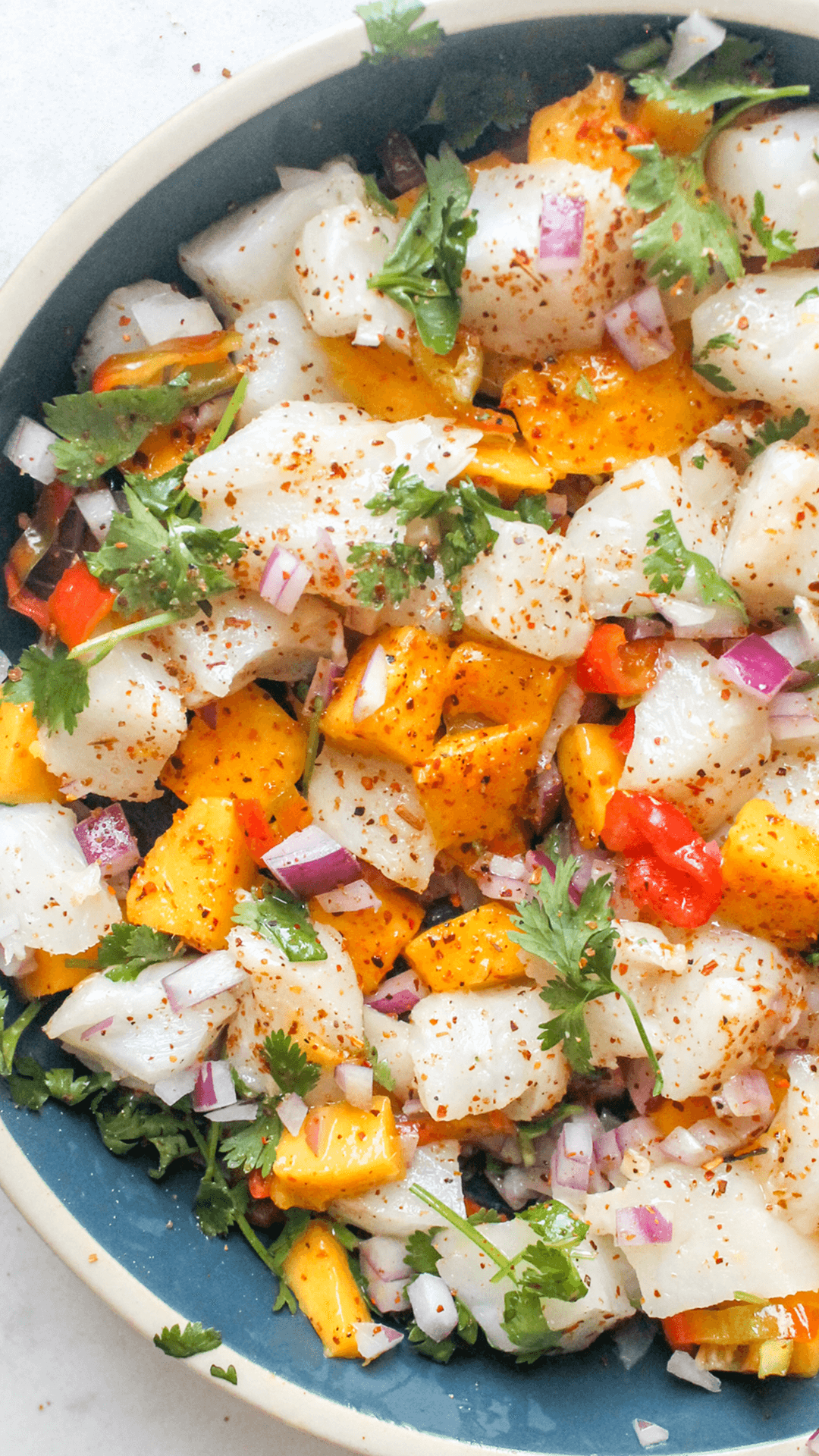 close up of a bowl of sea bass ceviche