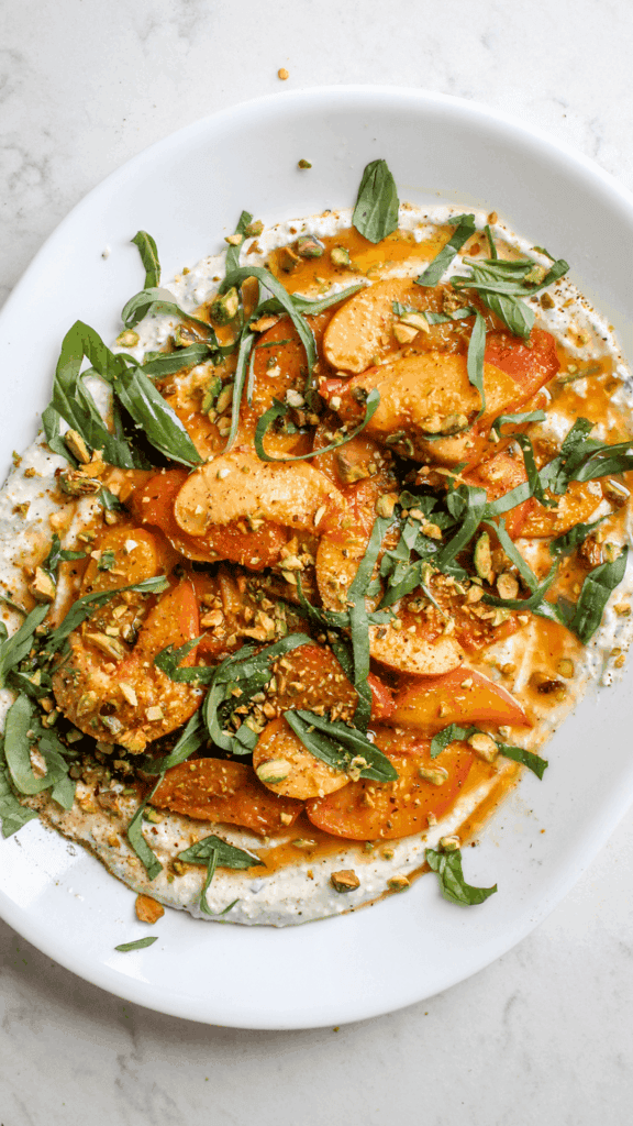 plate of whipped cottage cheese dip with peaches