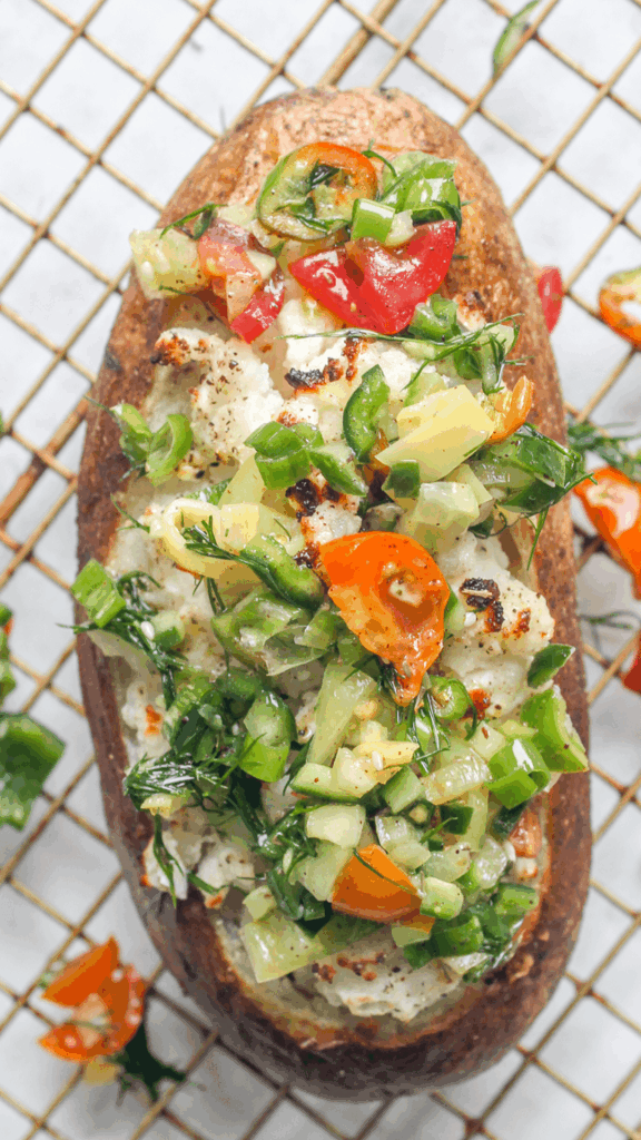 close up of a mediterranean baked potato