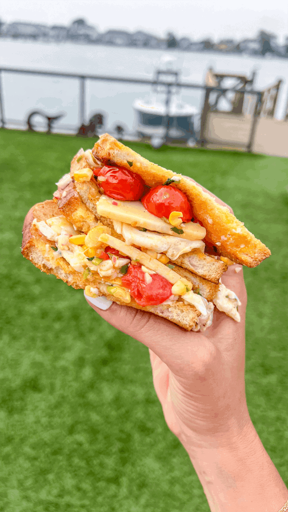 close up of blistered corn tomato sandwich