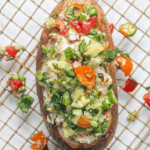 close up of a mediterranean baked potato