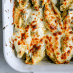 close up of pesto stuffed shells