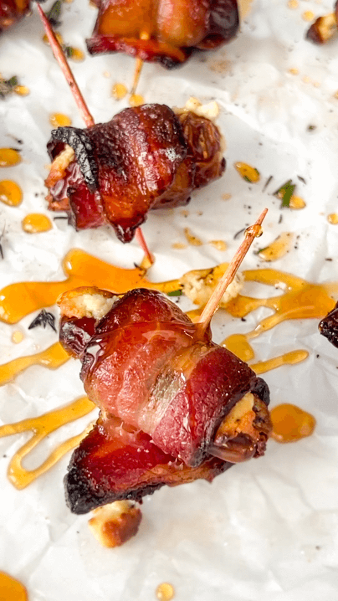 close up of a goat cheese bacon wrapped date