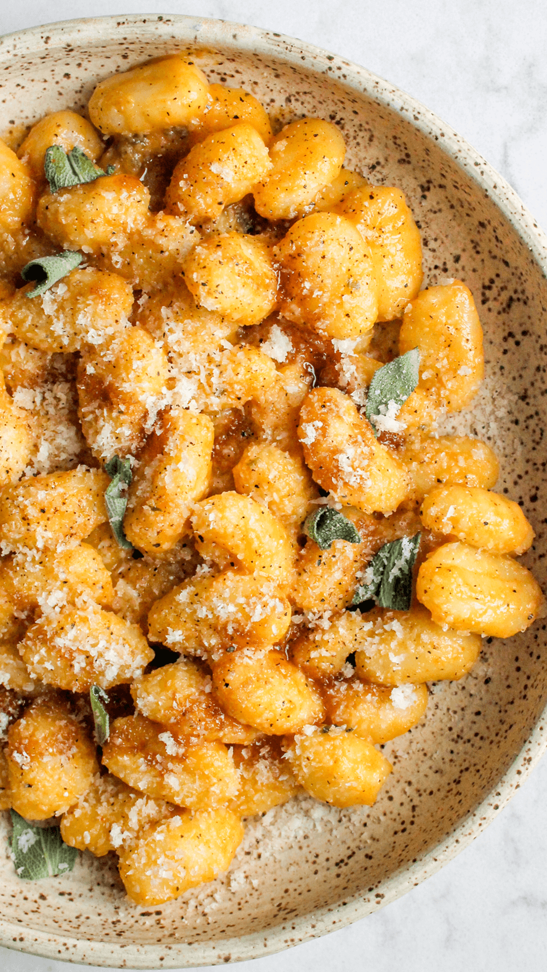 bowl of pumpkin garlic confit gnocchi