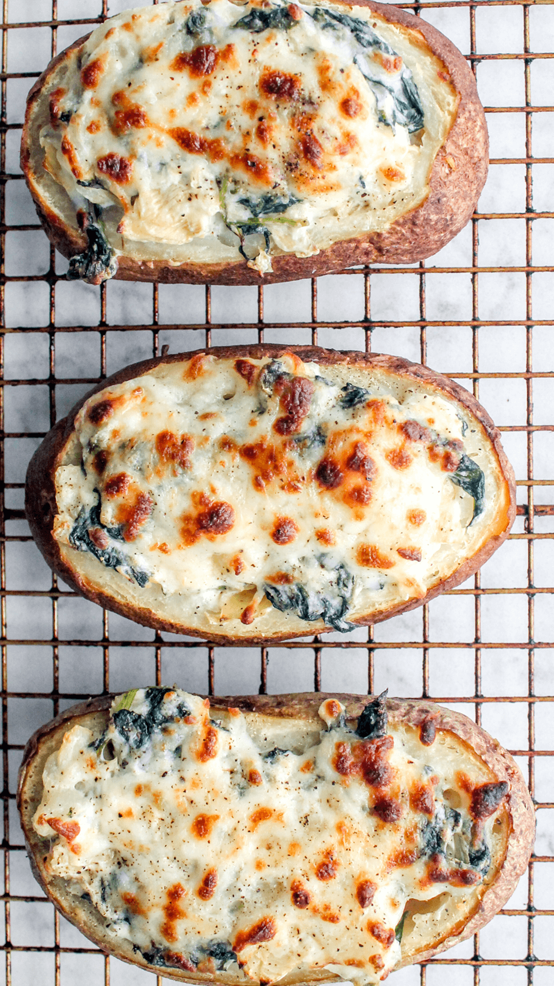 close up of Spinach Artichoke Twice Baked Potatoes
