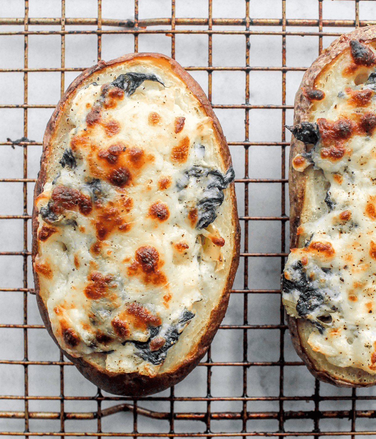 close up of a Spinach Artichoke Twice Baked Potato