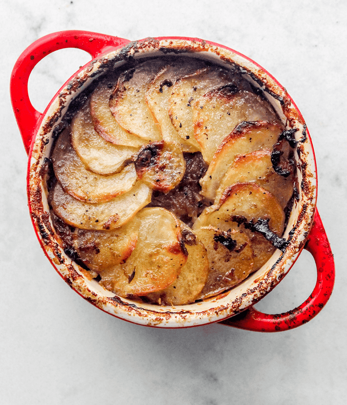 close up of cocotte french potatoes