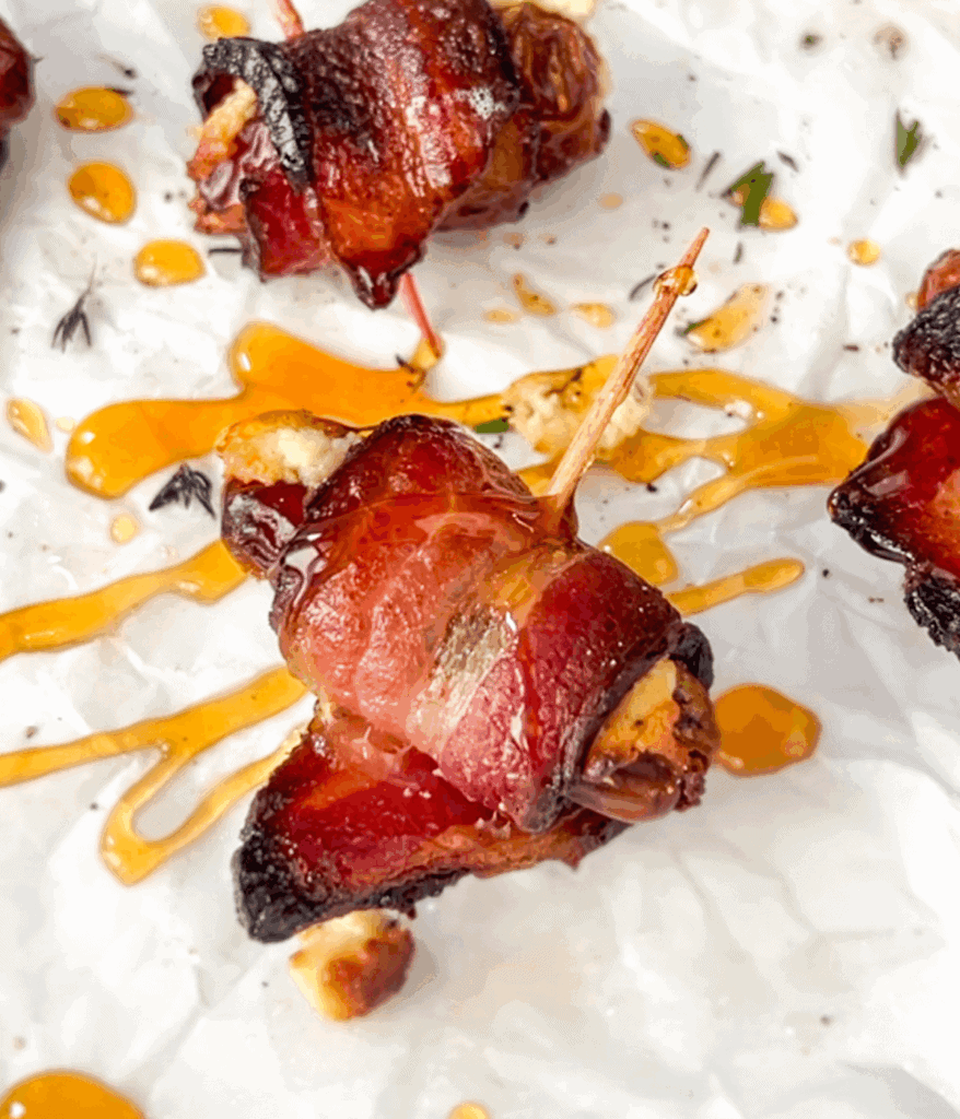 close up of a goat cheese bacon wrapped date