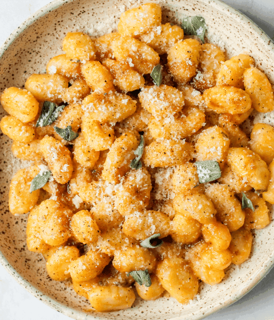 bowl of pumpkin garlic confit gnocchi
