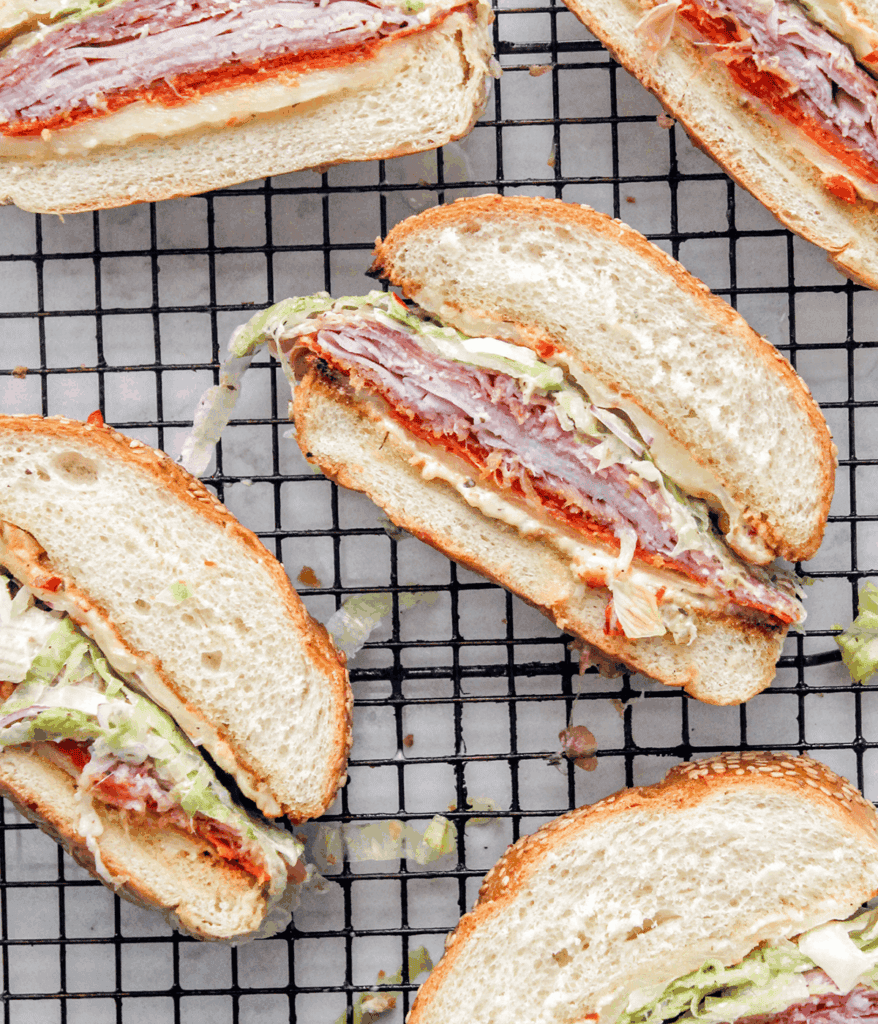 a bunch of mini italian sandwiches