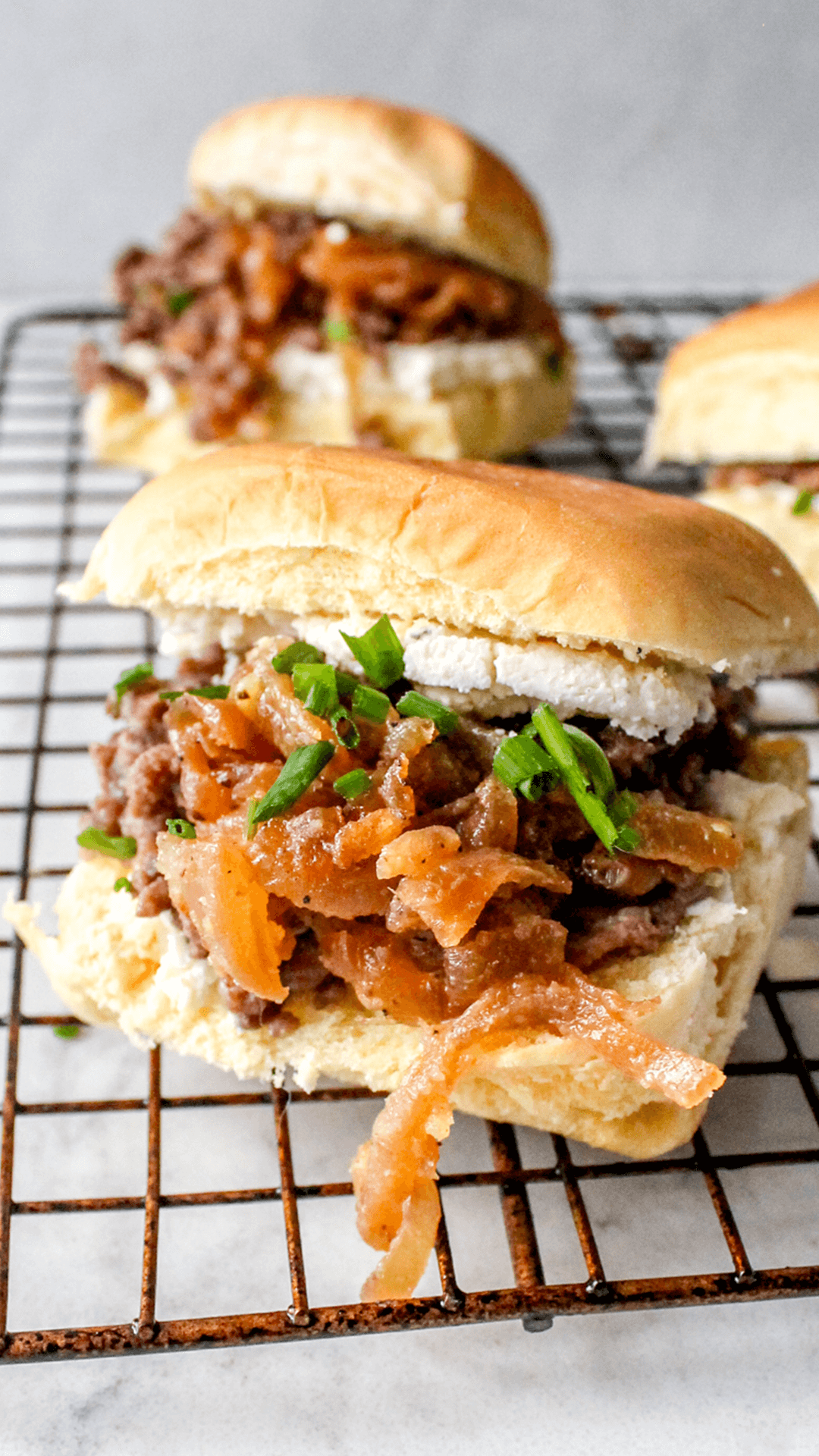 close up of french onion sliders