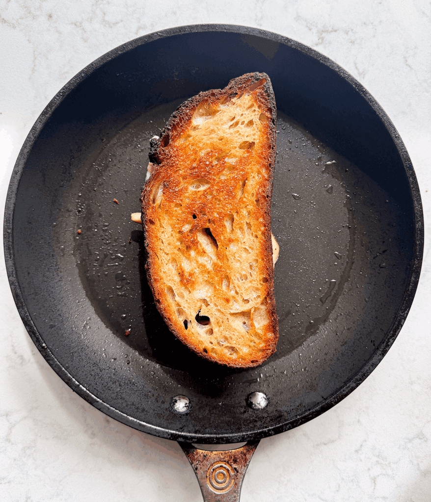 grilled cheese mushroom sandwich in a skillet