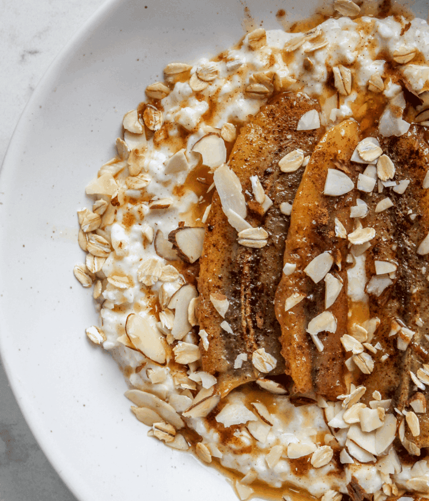 close up of cottage cheese breakfast bowl with bananas
