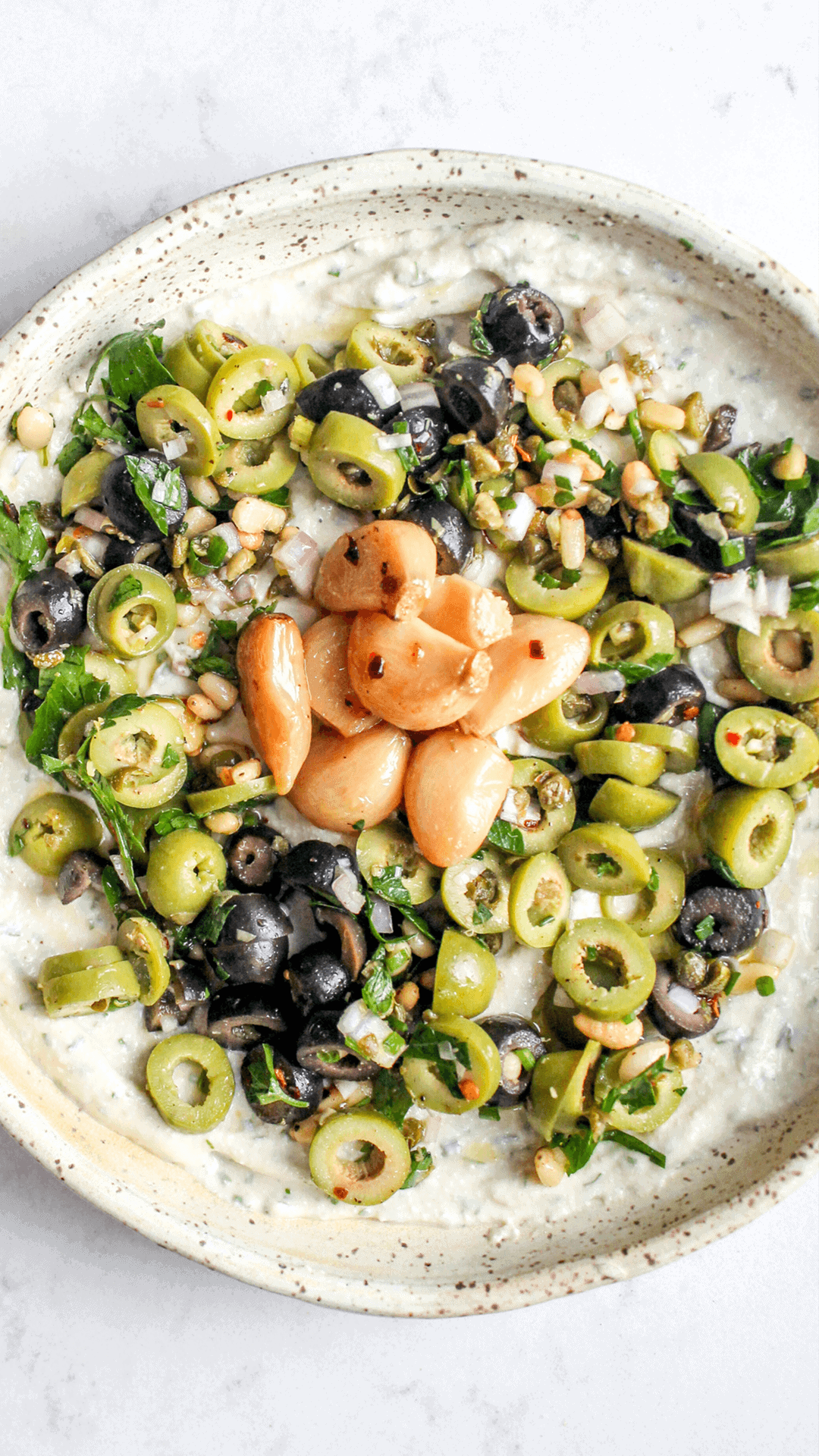 close up of garlic and herb cottage cheese dip