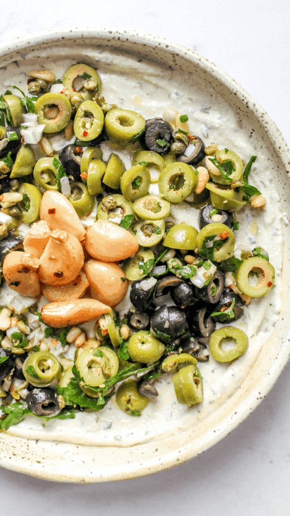 close up of garlic and herb cottage cheese dip