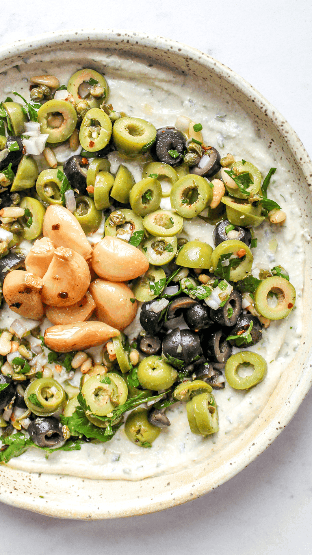 close up of garlic and herb cottage cheese dip