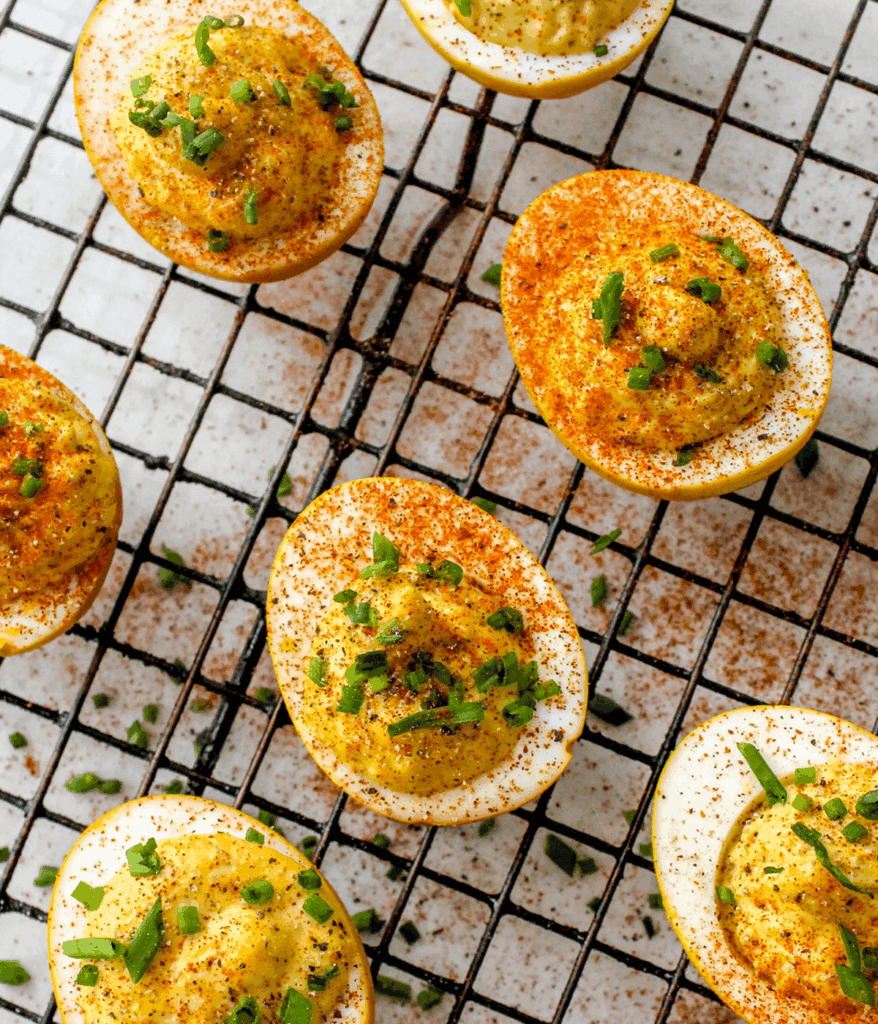 a bunch of golden deviled eggs