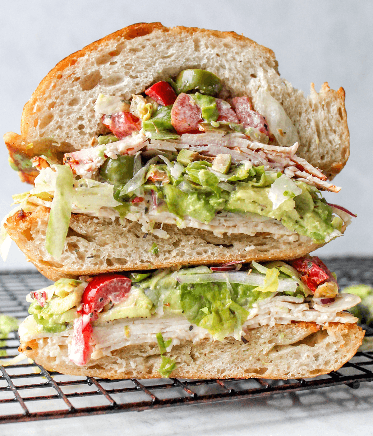 stacked turkey grinder sandwich