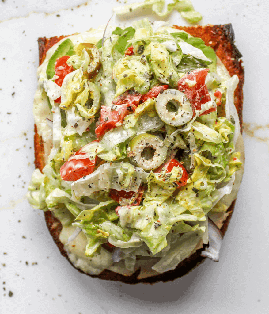 layered open turkey grinder sandwich