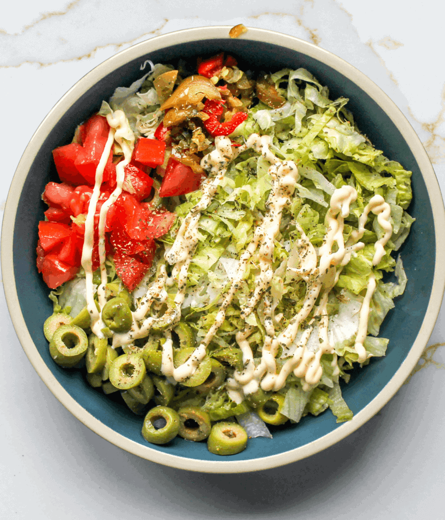 chopped iceberg in bowl for turkey grinder sandwich