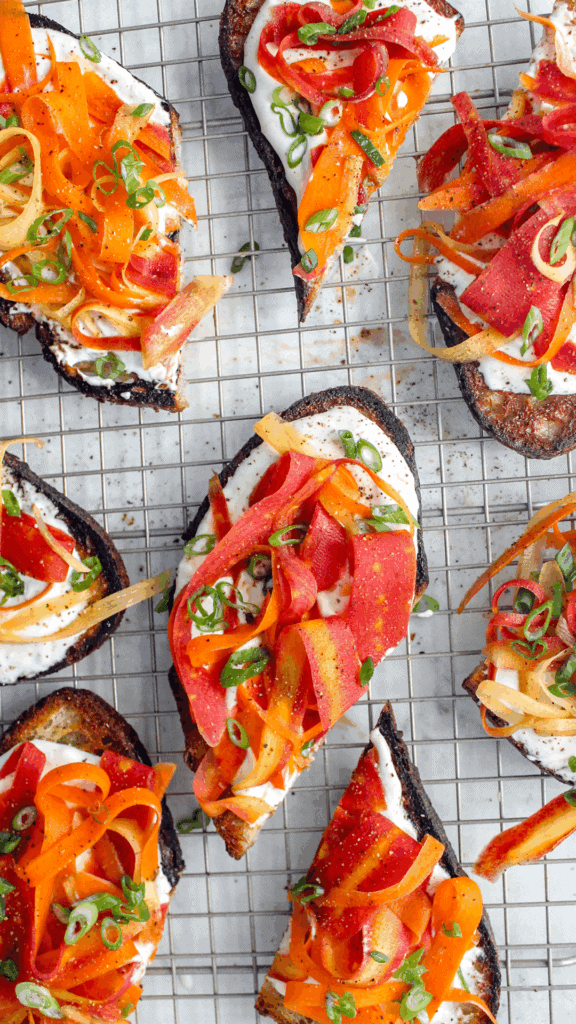 close up of miso cream cheese carrot crostinis